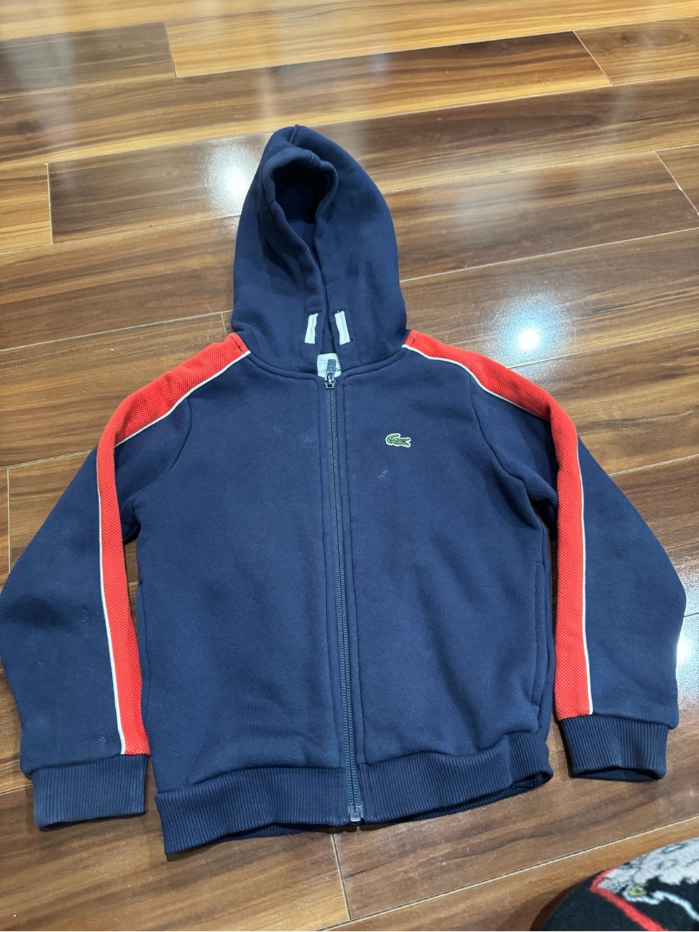Lacoste Navy Hooded Zip Sweatshirt with Red Sleeve Stripes